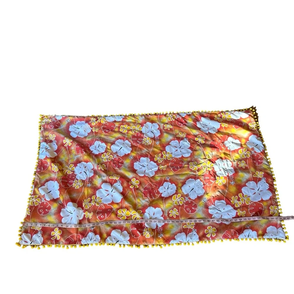 Green aloha print beach blanket